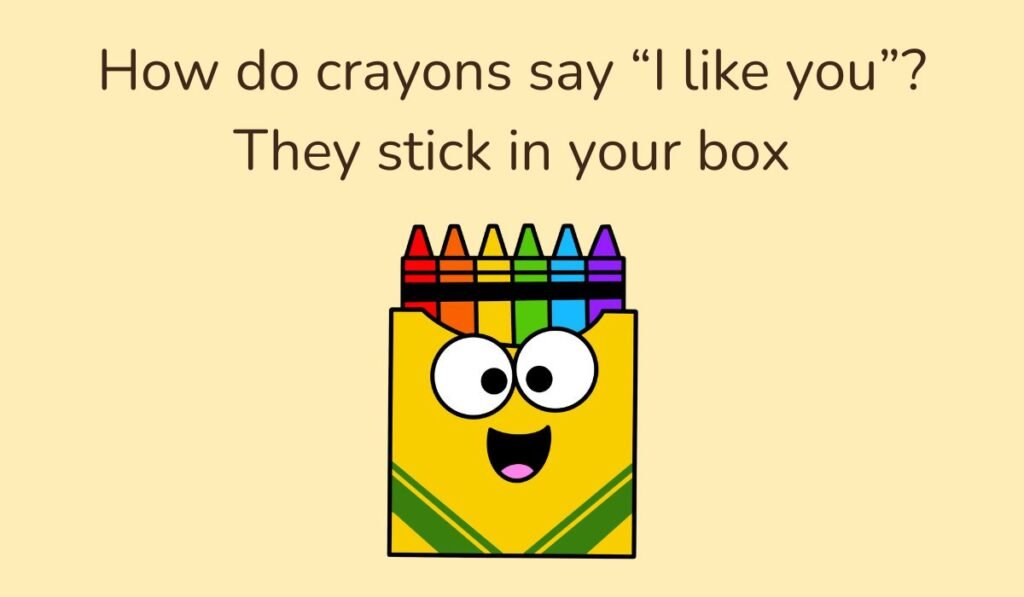 Cartoon crayon box with colorful crayons and smiling face, pun text ‘How do crayons say I like you? They stick in your box’.